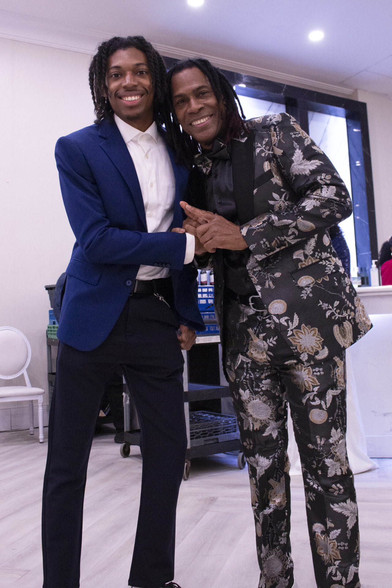 Jordan Steele (left) and Mark Steele Sr. (right), posing for camera